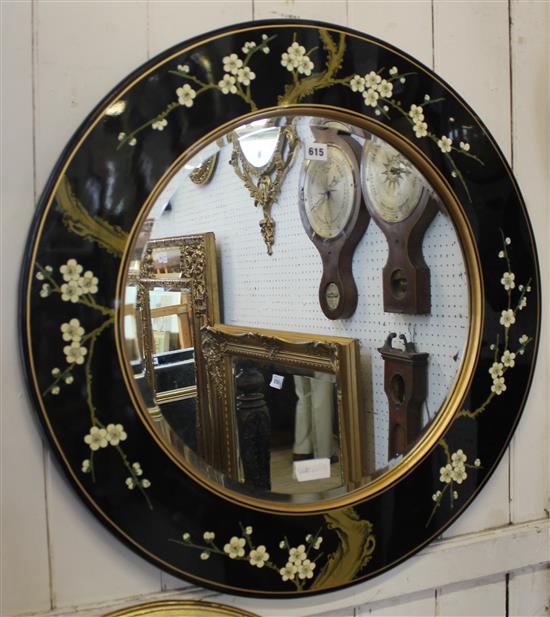 Circular ebonised floral decorated hall mirror